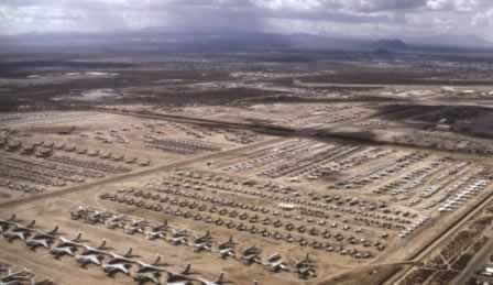 Aerial view of Davis-Monthan Air Force Base and AMARG airplane boneyard in Tucson, Arizona with rows of C-141 Starlifters, B-1B Lancers and F-111 Aardvarks in storage